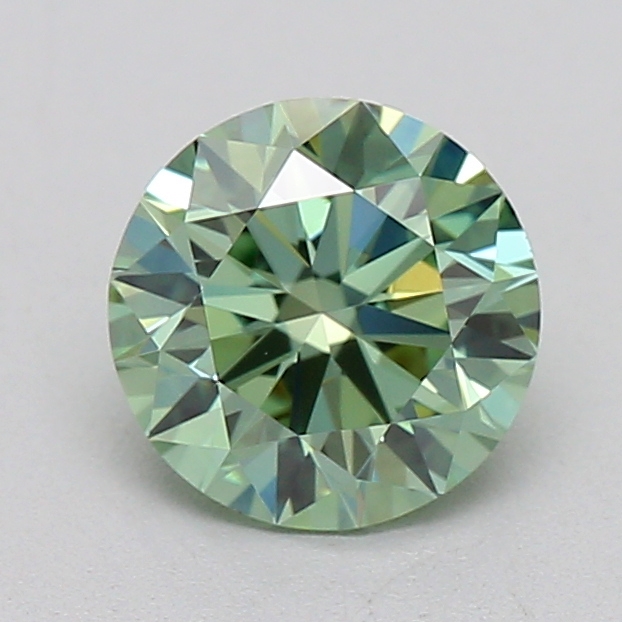 Actual 0.7 carat Vivid Green Round lab-grown diamond