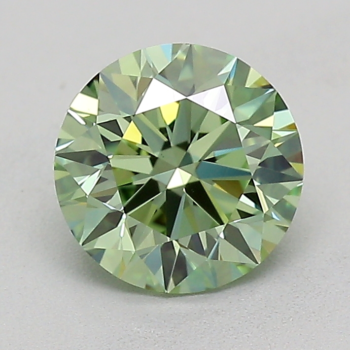 Actual 0.74 carat Vivid Green Round lab-grown diamond